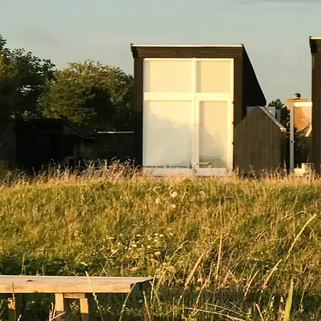 Feriehus Front Row With Sunset On Odden *